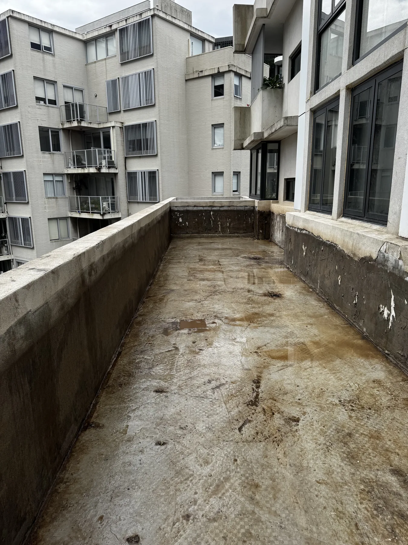 High-rise planter box after vac truck soil removal and clean-out