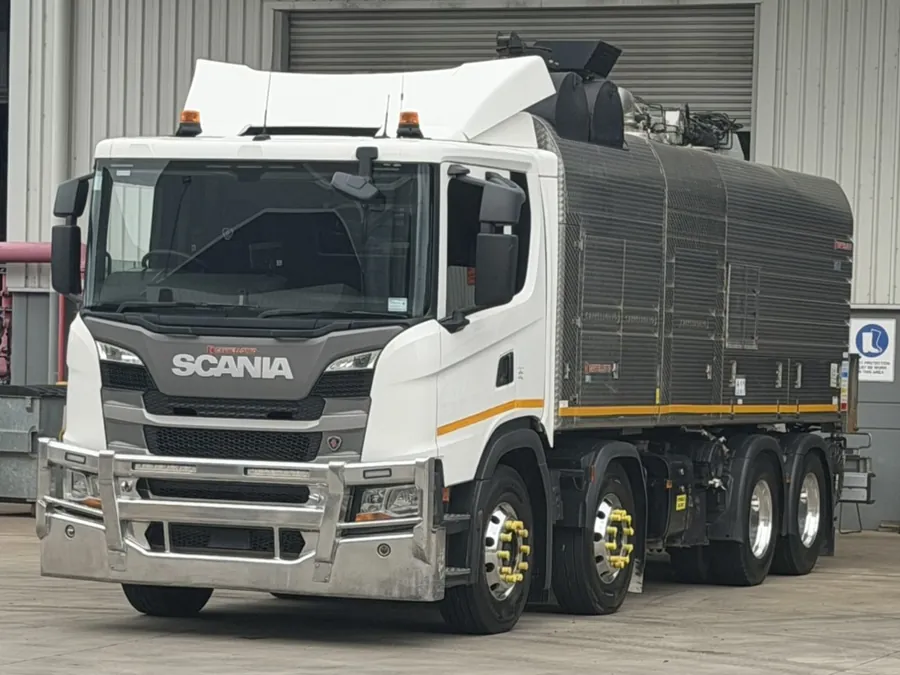 Scania vacuum truck in an industrial yard